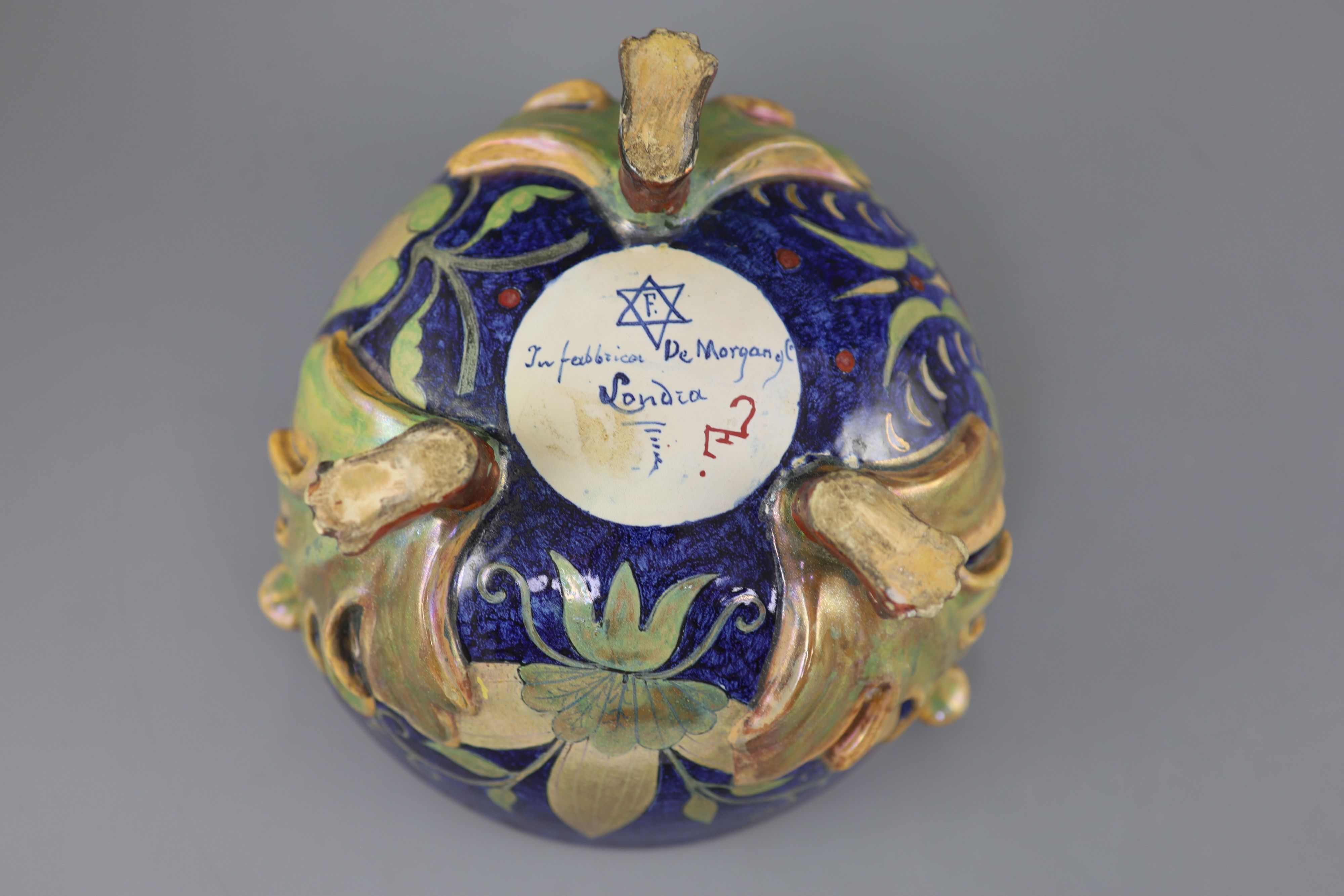 A rare William De Morgan lustre bowl, c.1890, decorated by A. Farini,